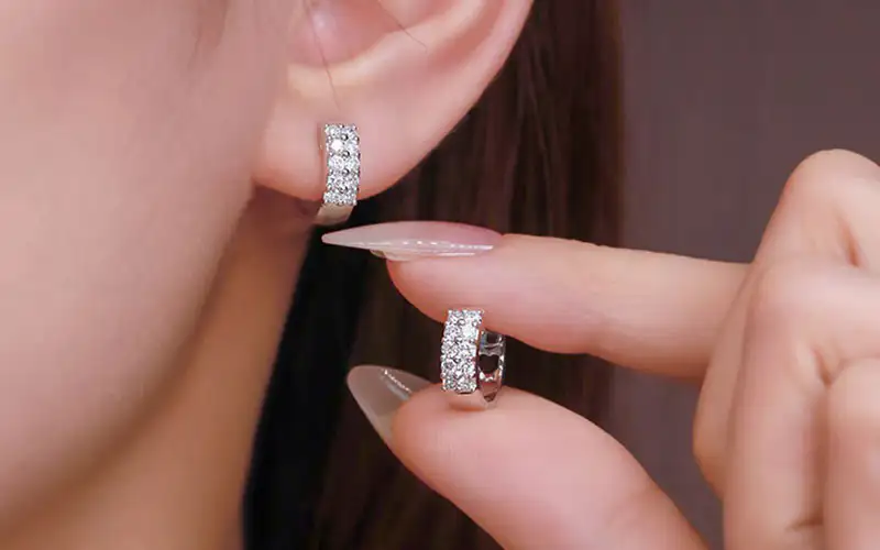 lab grown diamond huggie earrings wearing effect