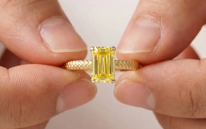 emerald cut solitaire fancy yellow lab diamond ring